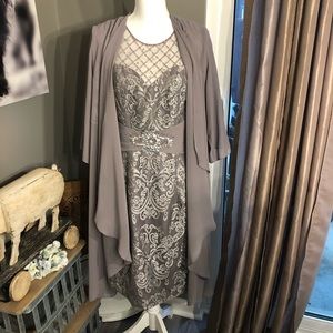NWOT Great holiday, new year, or mother of the bride dress. Gray color